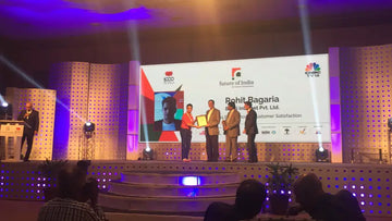 Refurbify receiving a CNBC award on stage